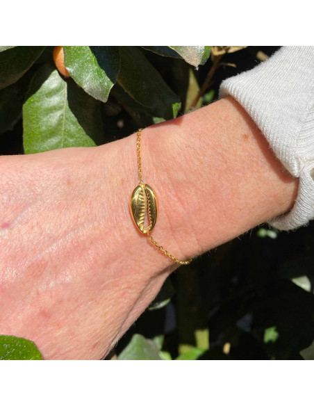 Bracelet Cauri sur chaine dorée