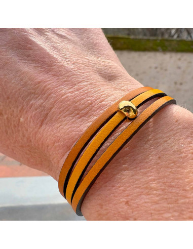 Bracelet cuir et perle dorée